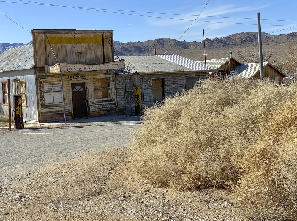 The derelict post office building in a semi-ghost town in the California desert.